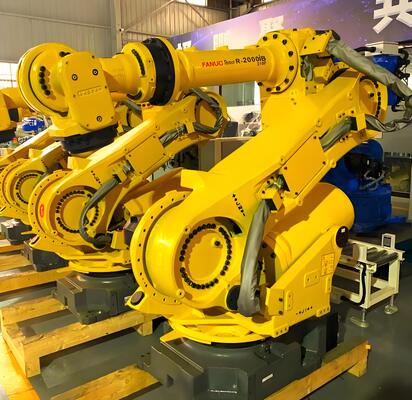 Ячейка лазерной резки FANUC с автоматической загрузкой/разгрузкой и поворотным столом для массового производства металлических 3D-заготовок в автомобильной промышленности