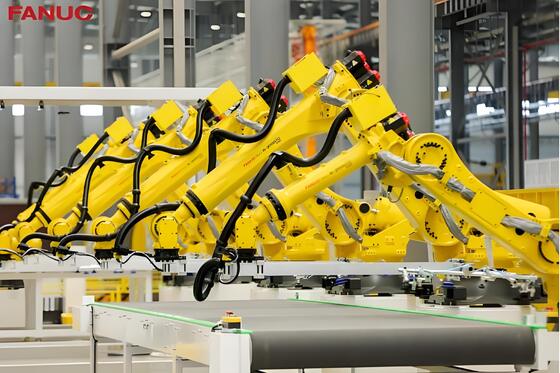 Ячейка лазерной резки FANUC с автоматической загрузкой/разгрузкой и поворотным столом для массового производства металлических 3D-заготовок в автомобильной промышленности